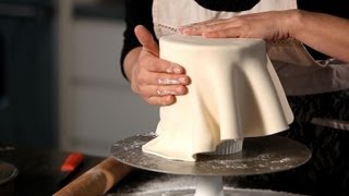 How to Cover a Cake in Fondant  Wedding Cakes [upl. by Osnofla]