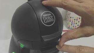 How to operate Nescafe Dolce Gusto Piccolo Coffee Machine Manual [upl. by Renruojos]