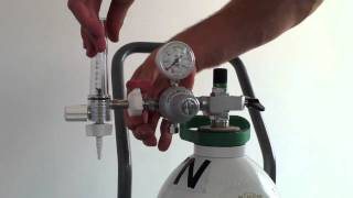 Fitting a Regulator amp Flowmeter to a Gas Cylinder  Demonstration [upl. by Zinah327]